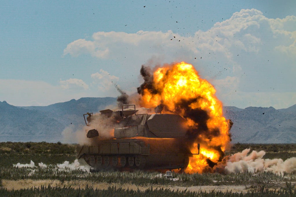 An Anduril Industries Altius-700M drone hits a mock SA-17 surface-to-air missile system during trials in 2023.