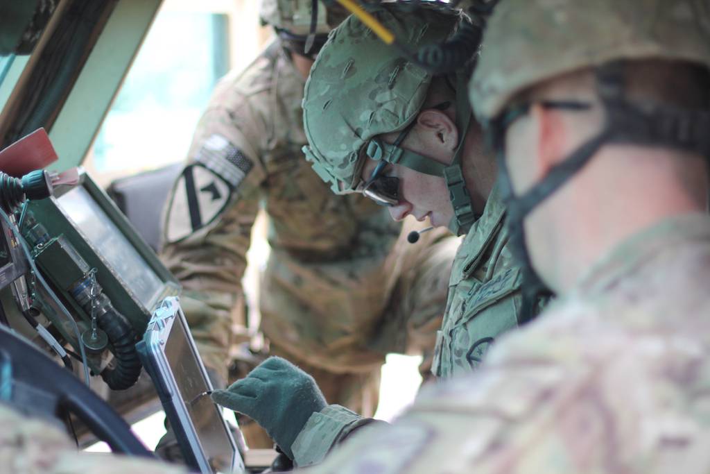 U.S. Army Spc. Sean Curl enters data into a new reconnaissance system during class held by the 1014th Sapper Company.