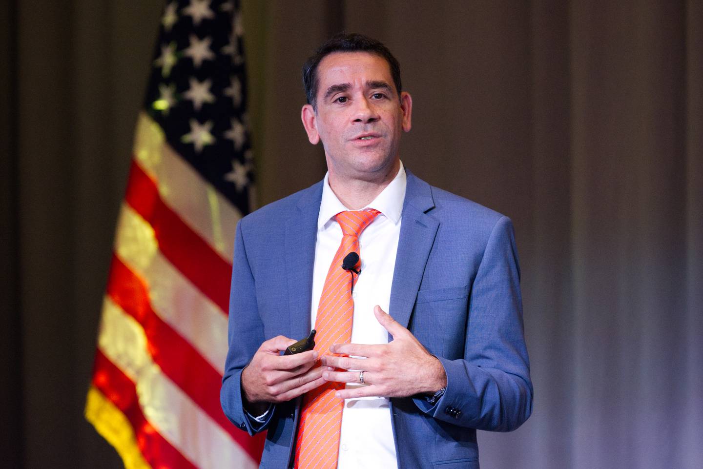 U.S. Army Chief Information Officer Leonel Garciga takes a pause during an Aug. 16, 2023, speech at the AFCEA TechNet Augusta conference in Georgia.